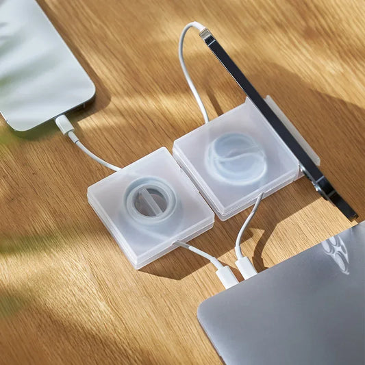 CableNest™ – Transparent Cord Organizer & Phone Stand